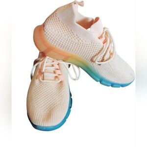 Pink and Blue Athletic Shoes with Breathable Mesh and Modern Design